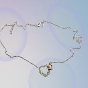 Interlocking two-tone heart necklace